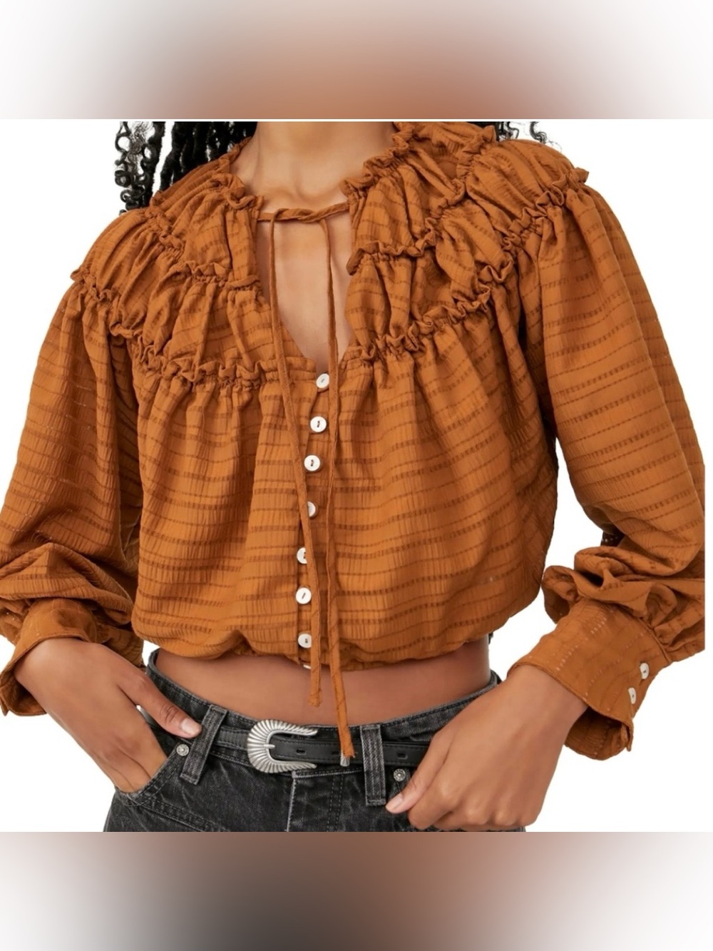 Like new Free People Hailey Blouse in a glazed ginger color with ruffle details.